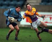4 February 2001; Alan Brogan of Dublin is tackled by Paraic Curtis of Wexford during the Leinster U21 Football Championship First Round match between Dublin and Wexford at Parnell Park in Dublin. Photo by Aoife Rice/Sportsfile