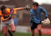 4 February 2001; Alan Brogan of Dublin is tackled by Paraic Curtis of Wexford during the Leinster U21 Football Championship First Round match between Dublin and Wexford at Parnell Park in Dublin. Photo by Aoife Rice/Sportsfile