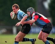 27 January 2001; Pat Duignan of Galwegians is tackled by Niall Malone of Belfast Harlequins during the AIB All-Ireland League Division 1 match between Galwegians RFC and Belfast Harlequins RFC at Crowley Park in Galway. Photo by Matt Browne/Sportsfile