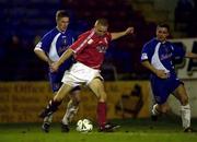 6 February 2001; Richie Foran of Shelbourne in action against Eamon Doherty and Eddie McCallion of Derry City during the Harp Lager FAI Cup Third Round replay match between Shelbourne and Derry City at Tolka Park in Dublin. Photo by David Maher/Sportsfile