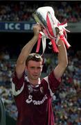 10 September 2000; Galway captain Richard Murray lifts the Irish Press Cup after the All Ireland Minor Hurling Championship Final match between Cork and Galway at Croke Park in Dublin. Photo by Ray McManus/Sportsfile