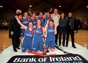 7 February 2001; The Scoil Ruane team celebrate with the cup after the Bank of Ireland Schools Cup Girls A Final match between Scoil Ruane, Killenaule, Tipperary and Presentation Thurles, Tipperary, at the National Bastetball Arena in Tallaght, Dublin. Photo by Brendan Moran/Sportsfile