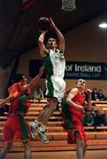 8 February 2001; Joe McCann of St. Nathy's in action against Ken Carroll, left and David Fahy of Oatlands during the Bank of Ireland Schools Cup Boys C Final match between St. Nathy's College in Ballaghadereen, Roscommon v Oatlands College in Mount Merrion, Dublin, at the National Bastetball Arena in Tallaght, Dublin. Photo by Brendan Moran/Sportsfile