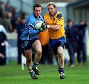10 February 2001; Paddy Christie of Dublin is tackled by Jason Neary of Roscommon during the Allianz GAA National Football League Division 1A match between Dublin and Roscommon at Parnell Park in Dublin. Photo by Ray McManus/Sportsfile