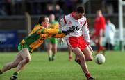 11 February 2001; Ciaran Gourley of Tyrone in action against Andrew Gallagher of Donegal during the Allianz National Football League Division 1B match between Tyrone and Donegal at Healy Park in Omagh, Tyrone. Photo by Damien Eagers/Sportsfile
