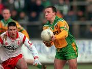 11 February 2001; Andrew Gallagher of Donegal in action against Ciaran Gourley of Tyrone during the Allianz National Football League Division 1B match between Tyrone and Donegal at Healy Park in Omagh, Tyrone. Photo by Damien Eagers/Sportsfile