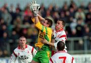 11 February 2001; John Gildea of Donegal fields a high ball ahead of Pascal Canavan of Tyrone during the Allianz National Football League Division 1B match between Tyrone and Donegal at Healy Park in Omagh, Tyrone. Photo by Damien Eagers/Sportsfile