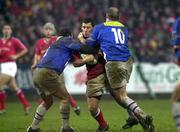 20 January 2001; Jason Holland of Munster is tackled by Damien Denechanny, left, and Gregor Townsend of Castres during the Heineken Cup Pool 4 Round 6 match between Munster and Castres at Musgrave Park in Cork Photo by Brendan Moran/Sportsfile