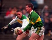 11 February 2001; Dara O Cinneide of Kerry in action against Ger Rafferty of Offaly during the Allianz National Football League Division 1A match between Offaly and Kerry at O'Connor Park in Tullamore, Offaly. Photo by Brendan Moran/Sportsfile