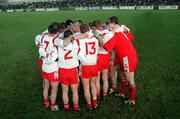 11 February 2001; The Tyrone team gather in a huddle prior to the Allianz National Football League Division 1B match between Tyrone and Donegal at Healy Park in Omagh, Tyrone. Photo by Damien Eagers/Sportsfile