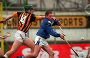 11 February 2001; John Lyons of Laois is tackled by Henry Shefflin of Kilkenny during the Allianz National Hurling League Division 1B Round 2 match between Kilkenny and Laois at Nowlan Park in Kilkenny. Photo by David Maher/Sportsfile