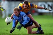 10 February 2001; Shane Ryan of Dublin is tackled by Clifford McDonald of Roscommon during the Allianz GAA National Football League Division 1A match between Dublin and Roscommon at Parnell Park in Dublin. Photo by Ray McManus/Sportsfile