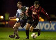 8 December 2000; Tony O'Connor of Bohemians in action against Dessie Baker of Shelbourne during the Eircom League Premier Division match between Bohemians and Shelbourne at Dalymount Park in Dublin. Photo by David Maher/Sportsfile