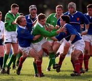 16 February 2001; Gordon D'Arcy of Ireland is tackled by Cedric Savignat, left, and Dimitri Yachvili of France during the U21 Rugby International match between Ireland and France at Templeville Road in Dublin. Photo by Brendan Moran/Sportsfile
