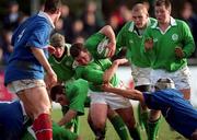 16 February 2001; Gavin Hickie of Ireland is tackled by Simon Azoulai of France during the U21 Rugby International match between Ireland and France at Templeville Road in Dublin. Photo by Brendan Moran/Sportsfile