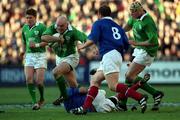 17 February 2001; Keith Wood of Ireland is tackled by Christophe Moni of France during the Lloyds TSB Six Nations Rugby Championship match between Ireland and France at Lansdowne Road in Dublin. Photo by Matt Browne/Sportsfile