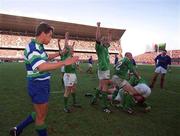 17 February 2001; Ireland players, including Peter Stringer and Malcolm O'Kelly celebrate at the final whistle during the Lloyds TSB Six Nations Rugby Championship match between Ireland and France at Lansdowne Road in Dublin. Photo by Brendan Moran/Sportsfile