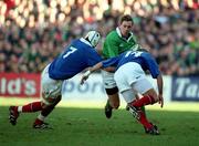 17 February 2001; Tyrone Howe of Ireland is tackled by Christophe Juillet, left,and Philippe Bernat-Salles of France during the Lloyds TSB Six Nations Rugby Championship match between Ireland and France at Lansdowne Road in Dublin. Photo by Brendan Moran/Sportsfile