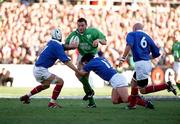 17 February 2001; Rob Henderson of Ireland is tackled by Christophe Juillet, left, and Franck Comba of France during the Lloyds TSB Six Nations Rugby Championship match between Ireland and France at Lansdowne Road in Dublin. Photo by Brendan Moran/Sportsfile