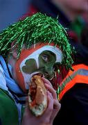 17 February 2001; An Ireland supporter eats their lunch prior to  the Lloyds TSB Six Nations Rugby Championship match between Ireland and France at Lansdowne Road in Dublin. Photo by Brendan Moran/Sportsfile