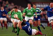 17 February 2001; David Wallace of Ireland is tackled by Xavier Garbajosa of France during the Lloyds TSB Six Nations Rugby Championship match between Ireland and France at Lansdowne Road in Dublin. Photo by Matt Browne/Sportsfile