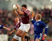 18 February 2001; Enda Lavelle of Crossmolina Deel Rovers is tackled by Gareth Doherty of Bellaghy Wolfe Tones during the AIB All-Ireland Senior Club Football Championship Semi-Final match between Crossmolina Deel Rovers v Bellaghy Wolfe Tones at Brewster Park in Enniskillen, Fermanagh. Photo by Ray McManus/Sportsfile