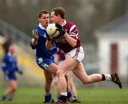 18 February 2001; Tom Nallen of Crossmolina Deel Rovers is tackled by Gavin Diamond of Bellaghy Wolfe Tones during the AIB All-Ireland Senior Club Football Championship Semi-Final match between Crossmolina Deel Rovers v Bellaghy Wolfe Tones at Brewster Park in Enniskillen, Fermanagh. Photo by Ray McManus/Sportsfile
