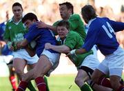 17 February 2001; Xavier Garbajosa of France is tackled by Rob Henderson and Brian O'Driscoll of Ireland during the Lloyds TSB Six Nations Rugby Championship match between Ireland and France at Lansdowne Road in Dublin. Photo by Brendan Moran/Sportsfile