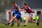 18 February 2001; Karl Diamond of Bellaghy Wolfe Tones is tackled by Crossmolina's Michael Moyles, left, and James Nallen of Crossmolina Deel Rovers during the AIB All-Ireland Senior Club Football Championship Semi-Final match between Crossmolina Deel Rovers v Bellaghy Wolfe Tones at Brewster Park in Enniskillen, Fermanagh. Photo by Ray McManus/Sportsfile