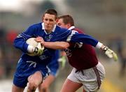 18 February 2001; Francis Glackin of Bellaghy Wolfe Tones is tackled by Stephen Rochford of Crossmolina Deel Rovers during the AIB All-Ireland Senior Club Football Championship Semi-Final match between Crossmolina Deel Rovers v Bellaghy Wolfe Tones at Brewster Park in Enniskillen, Fermanagh. Photo by Ray McManus/Sportsfile