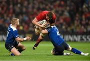 27 December 2015; Dave Foley, Munster, is tackled by Jamie Heaslip and Ian Madigan, Leinster. Guinness PRO12, Round 10, Munster v Leinster. Thomond Park, Limerick. Picture credit: Diarmuid Greene / SPORTSFILE