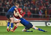 27 December 2015; Mike Sherry, Munster, is tackled by Luke Fitzgerald, left, and Ross Molony, Leinster. Guinness PRO12, Round 10, Munster v Leinster. Thomond Park, Limerick. Picture credit: Stephen McCarthy / SPORTSFILE