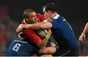 27 December 2015; Simon Zebo, Munster, is tackled by Dominic Ryan, 6, and Devin Toner, Leinster. Guinness PRO12, Round 10, Munster v Leinster. Thomond Park, Limerick. Picture credit: Stephen McCarthy / SPORTSFILE