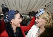 28 December 2015; New friends, Ciara Grehan, left, from Shannonbridge, Co. Offaly, and Sarah Culleton, from Mooncoin, Co. Kilkenny, at the races. Leopardstown Christmas Racing Festival, Leopardstown Racecourse, Dublin. Picture credit: Cody Glenn / SPORTSFILE