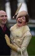 28 December 2015; Winner of the Monart Most Stylish Lady competition, Carol Kennelly, from Tralee, Co. Kerry with her husband Kerry after she received her prize. Leopardstown Christmas Racing Festival, Leopardstown Racecourse, Dublin.  Picture credit: Ray McManus / SPORTSFILE