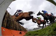 28 December 2015; Whatsforuwontgobyu, with Barry Geraghty up, , second left, jump the last, first time round, on their way to winning the Irish Daily Star Christmas Novice Handicap Hurdle. Leopardstown Christmas Racing Festival, Leopardstown Racecourse, Dublin. Picture credit: Ramsey Cardy / SPORTSFILE