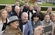 29 December 2015; Racegoers from Wexford snap a group selife before the races. Leopardstown Christmas Racing Festival, Leopardstown Racecourse, Dublin. Picture credit: Cody Glenn / SPORTSFILE