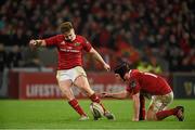 27 December 2015; Rory Scannell, Munster, kicks a conversion with the assistance of team-mate Tyler Bleyendaal. Guinness PRO12, Round 10, Munster v Leinster. Thomond Park, Limerick. Picture credit: Diarmuid Greene / SPORTSFILE