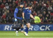 27 December 2015; Cian Healy, Leinster, leaves the field with Leinster physiotherapist Karl Denvir after picking up an injury. Guinness PRO12, Round 10, Munster v Leinster. Thomond Park, Limerick. Picture credit: Diarmuid Greene / SPORTSFILE