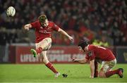 27 December 2015; Rory Scannell, Munster, kicks a conversion with the assistance of team-mate Tyler Bleyendaal. Guinness PRO12, Round 10, Munster v Leinster. Thomond Park, Limerick. Picture credit: Diarmuid Greene / SPORTSFILE