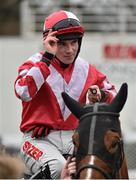 29 December 2015; Jonathon Burke salutes the crowd on Acapella Bourgeois after winning the Copper Face Jacks Maiden Hurdle. Leopardstown Christmas Racing Festival, Leopardstown Racecourse, Dublin. Picture credit: Cody Glenn / SPORTSFILE