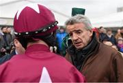 29 December 2015; Owner, Michael O'Leary of the Gigginstown House stud, speaks to jockey Bryan Cooper, after No More Heroes won the Neville Hotels Novice Steeplechase. Leopardstown Christmas Racing Festival, Leopardstown Racecourse, Dublin.