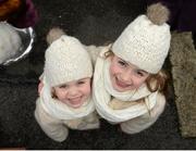 29 December 2015; Racegoers sisters  Éabha Devitt, age, 5, and Muireann, age 7, at the races. Leopardstown Christmas Racing Festival, Leopardstown Racecourse, Dublin. Picture credit: Cody Glenn / SPORTSFILE