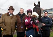 29 December 2015; Jockey Bryan Cooper, with owners Edward O'Leary, left, and Michael O'Leary of Gigginstown House Stud, after No More Heroes won the Neville Hotels Novice Steeplechase. Leopardstown Christmas Racing Festival, Leopardstown Racecourse, Dublin. Picture credit: Brendan Moran / SPORTSFILE