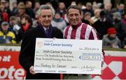 29 December 2015; Trainer Jim Bolger, left, and Jockey Davy Russell make a presentation of a cheque to the Irish Cancer Society during the day's racing. Leopardstown Christmas Racing Festival, Leopardstown Racecourse, Dublin. Picture credit: Brendan Moran / SPORTSFILE