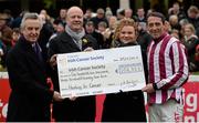 29 December 2015; Trainer Jim Bolger, left, and Jockey Davy Russell make a presentation of a cheque to Mark Mellett, Head of Fundraising, Irish Cancer Society, and Ruth Rowan, Philanthropy Manager, Irish Cancer Society, during the day's racing. Leopardstown Christmas Racing Festival, Leopardstown Racecourse, Dublin. Picture credit: Brendan Moran / SPORTSFILE