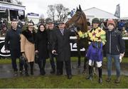 28 December 2015; Jockey Chris Timmons and trainer Edward Cawley with the winning connections of Forever Gold after winning the Pertemps Network Handicap Hurdle. Leopardstown Christmas Racing Festival, Leopardstown Racecourse, Dublin.. Photo by Sportsfile