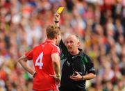 20 September 2009; Referee Martin Duffy issues a yellow card to Anthony Lynch. GAA Football All-Ireland Senior Championship Final, Kerry v Cork, Croke Park, Dublin. Picture credit: Stephen McCarthy / SPORTSFILE