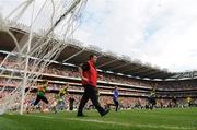 20 September 2009; Security personnel get into position to protect the goalmouth and posts as Kerry supporters run onto the pitch to celebrate after the final whistle. GAA Football All-Ireland Senior Championship Final, Kerry v Cork, Croke Park, Dublin. Picture credit: Stephen McCarthy / SPORTSFILE