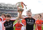 20 September 2009; Armagh players, from left, Stephen O'Reilly, Christopher McCafferty, Darren Kelly and Kevin Nugent celebrate with the Tom Markham Cup. ESB GAA Football All-Ireland Minor Championship Final, Armagh v Mayo, Croke Park, Dublin. Picture credit: Pat Murphy / SPORTSFILE